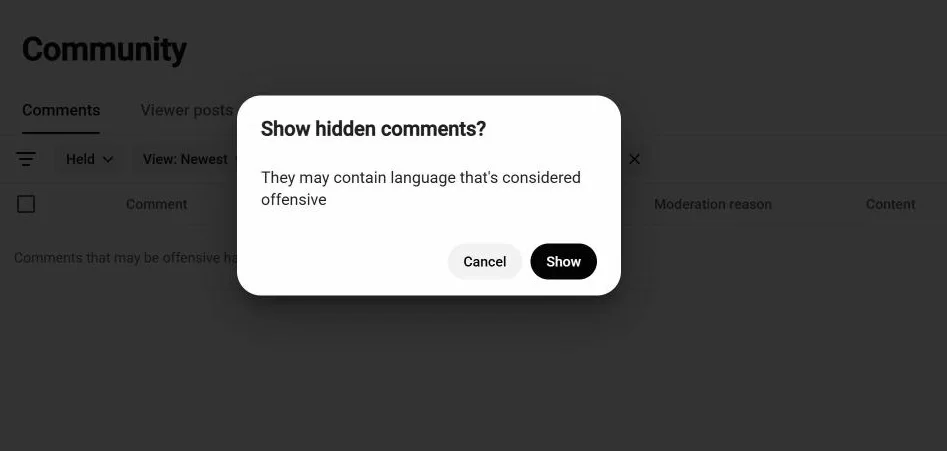 Studio hides the held comments behind a confirmation, because they may contain language that is considered offensive. On my channel the current one is a viewer swearing at me about the AWS free tier. YouTube caught it before anyone else saw it.